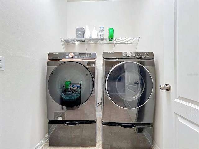 3857 San Isidro Cir, Saint Cloud, FL 34772 - laundry room featuring washer and dryer