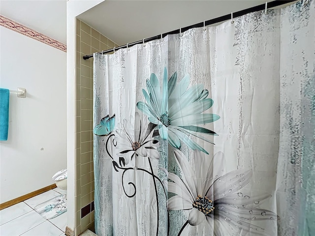 bathroom with a shower with shower curtain