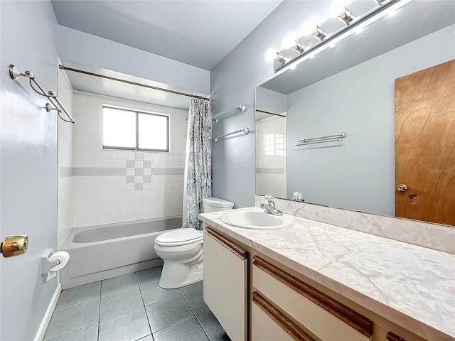 full bathroom featuring vanity, toilet, tile patterned flooring, and shower / bath combo