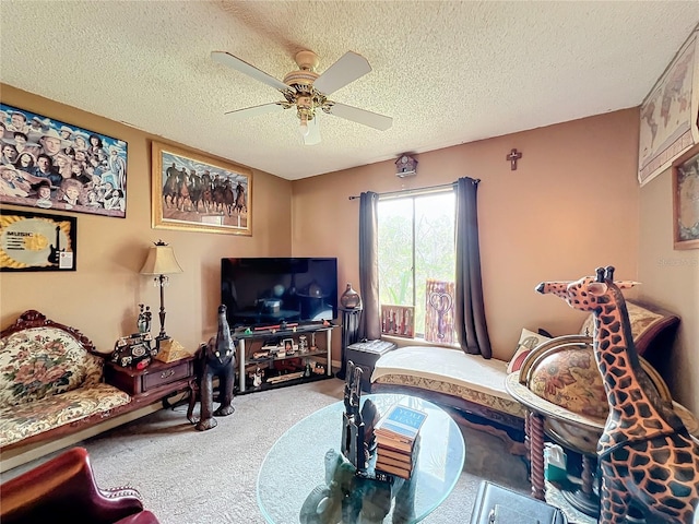 living room featuring a textured ceiling, ceiling fan, and carpet flooring