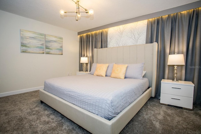 carpeted bedroom featuring a notable chandelier