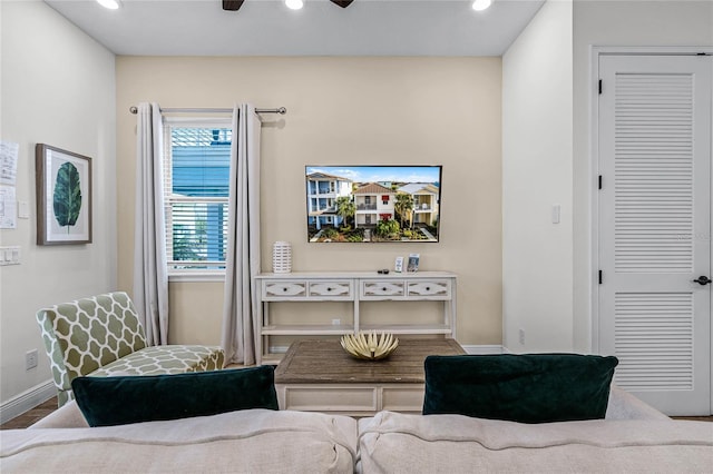 living room with ceiling fan