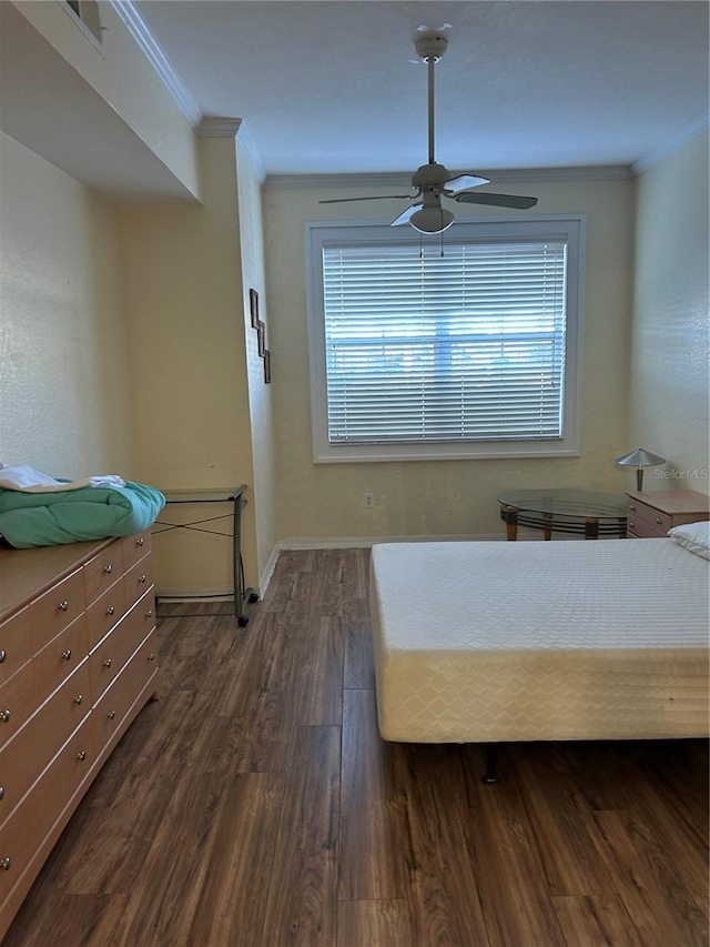 unfurnished bedroom featuring multiple windows, crown molding, dark hardwood / wood-style floors, and ceiling fan