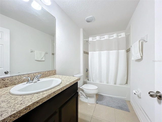 full bathroom with shower / tub combo, tile patterned flooring, vanity, a textured ceiling, and toilet