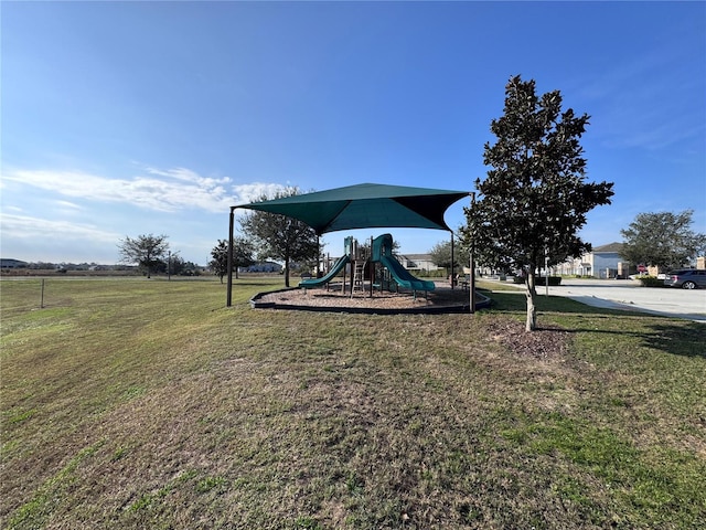 view of playground with a yard