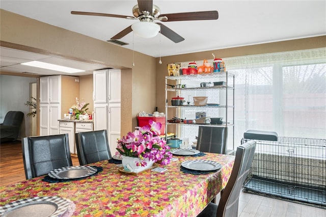 dining room featuring light hardwood / wood-style floors