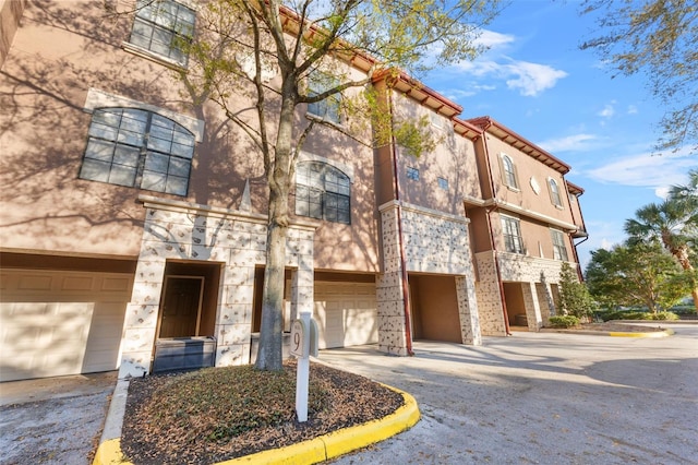 view of building exterior with a garage