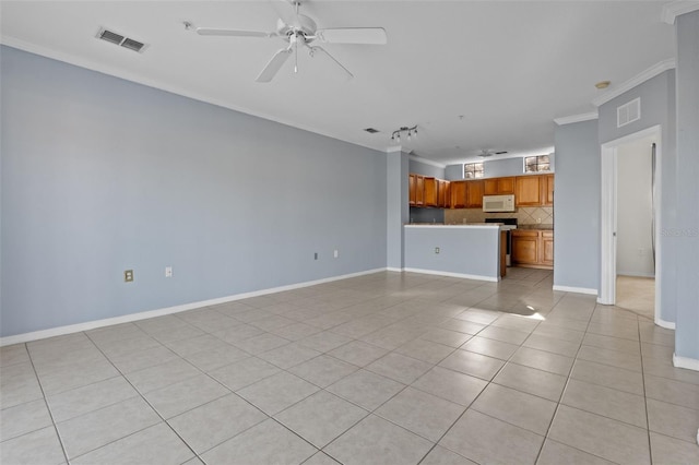 unfurnished living room featuring crown molding, light tile patterned flooring, and ceiling fan