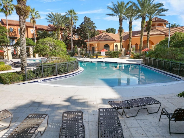 view of pool featuring a patio area