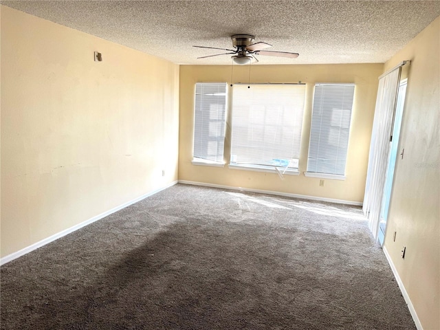 unfurnished room featuring a textured ceiling, baseboards, and carpet flooring