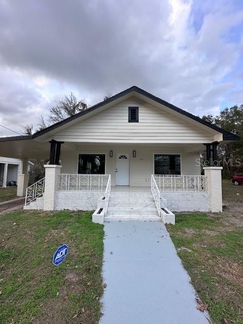 bungalow-style home featuring covered porch