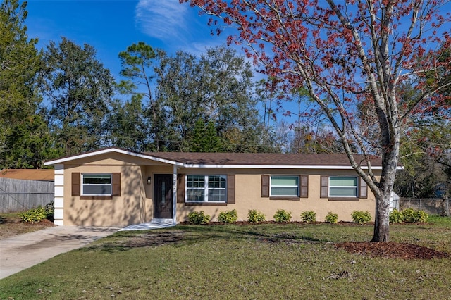 ranch-style house with a front yard