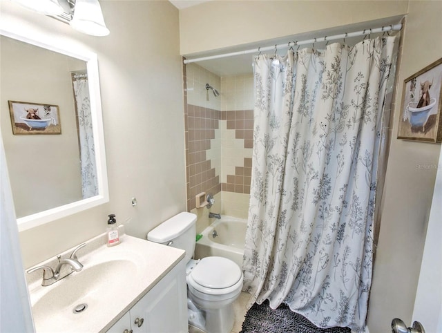 full bathroom featuring vanity, shower / tub combo with curtain, and toilet