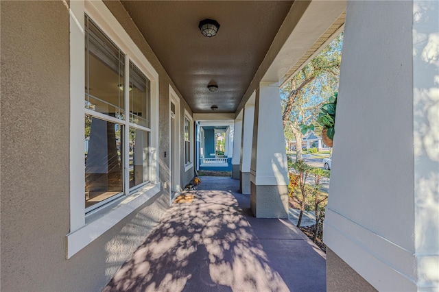 property entrance with covered porch