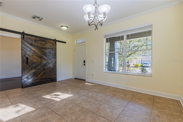 foyer featuring ornamental molding, a barn door, light tile patterned floors, and a notable chandelier