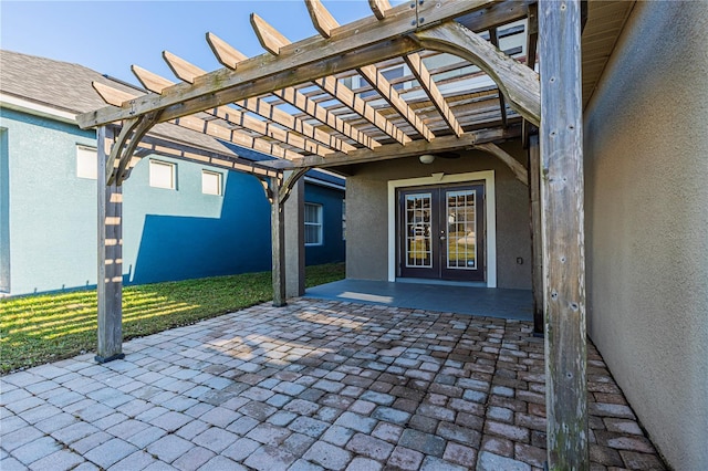 view of patio / terrace featuring a pergola and french doors