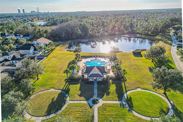 birds eye view of property with a water view