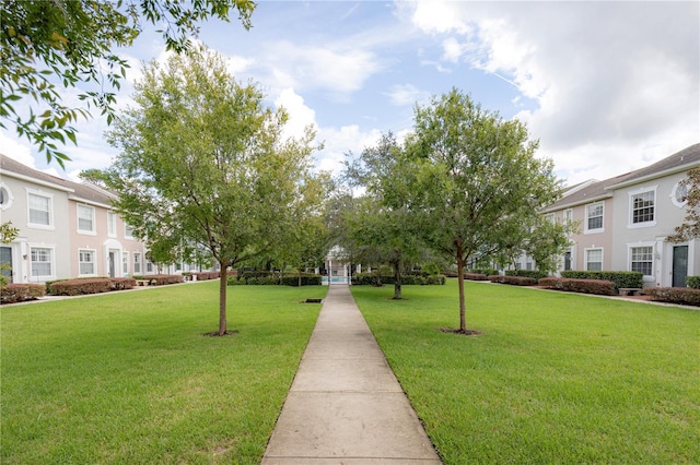 view of community with a lawn