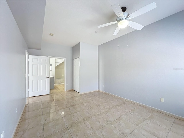 unfurnished room with ceiling fan