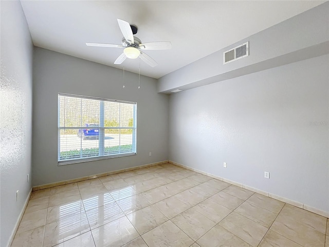 unfurnished room with ceiling fan