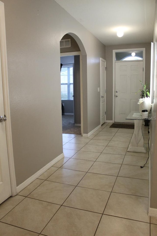 view of tiled foyer entrance