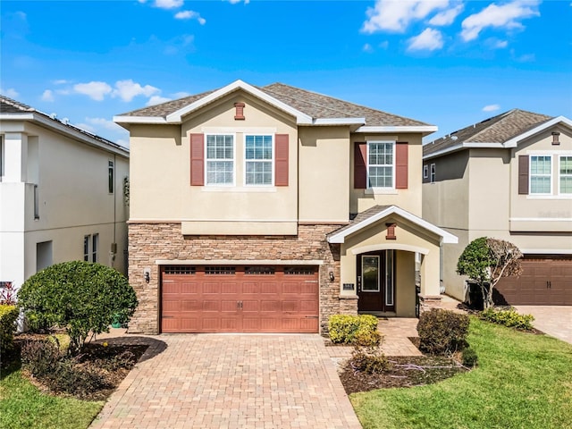 view of front of home with a garage