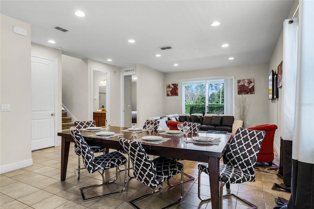 dining room featuring light tile patterned flooring