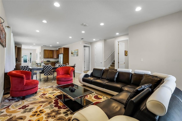 living room with light tile patterned floors