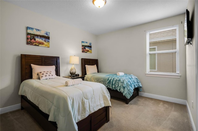 bedroom with light carpet