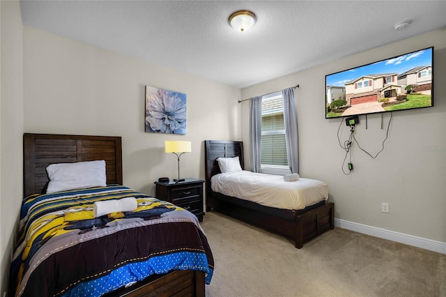 carpeted bedroom with a textured ceiling