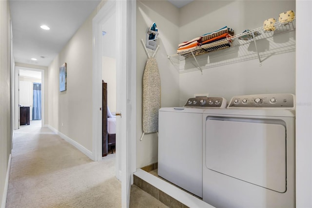 washroom with light colored carpet and independent washer and dryer