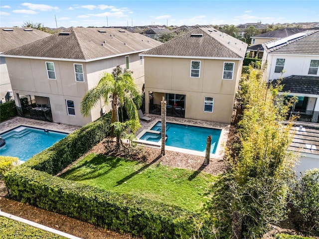 view of pool featuring a yard and a patio area