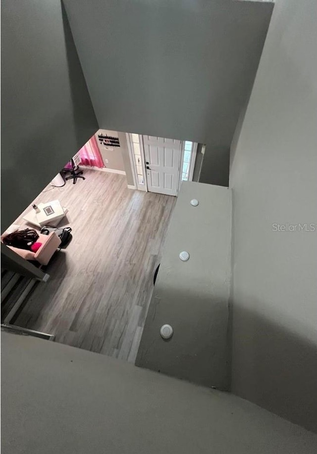 interior space with hardwood / wood-style flooring