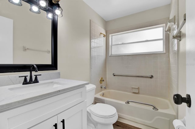 full bath featuring toilet, shower / washtub combination, and vanity