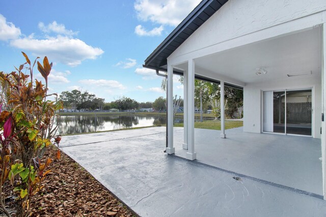 view of patio / terrace featuring a water view