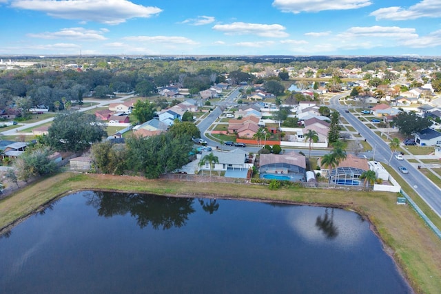 bird's eye view featuring a water view and a residential view