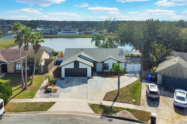 birds eye view of property featuring a water view