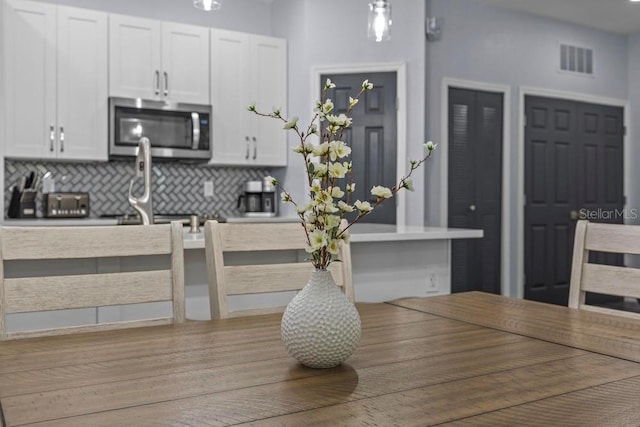 interior space with hardwood / wood-style floors