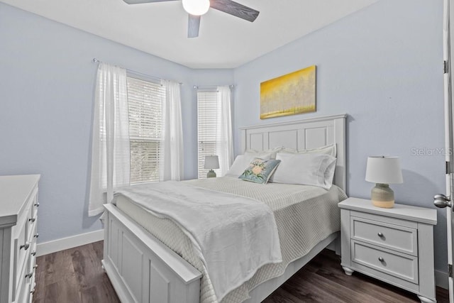 bedroom featuring dark wood-type flooring and ceiling fan