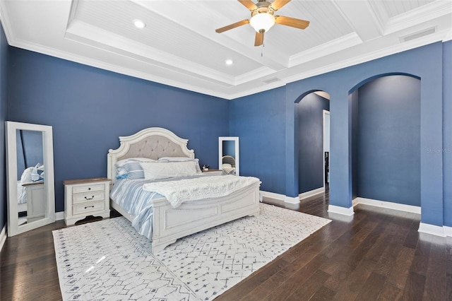 bedroom featuring visible vents, arched walkways, baseboards, beamed ceiling, and wood finished floors