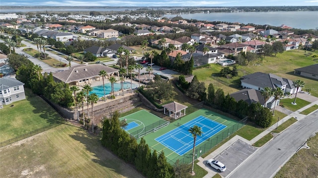 aerial view featuring a water view and a residential view