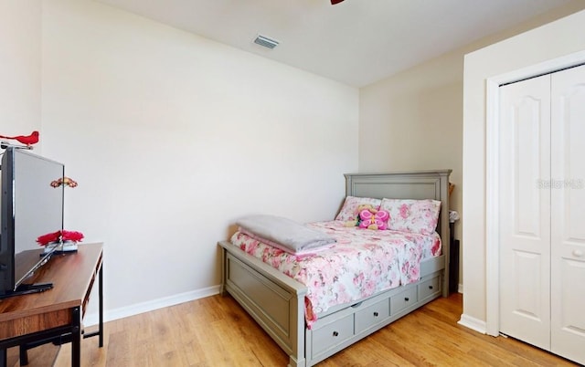 bedroom with light wood-type flooring