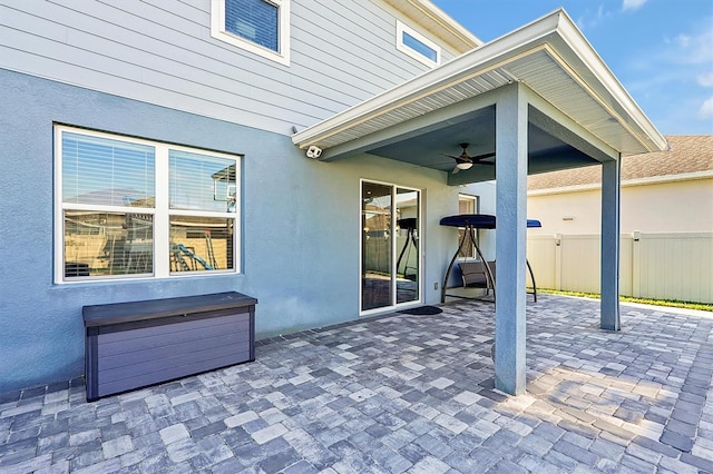 view of patio with ceiling fan