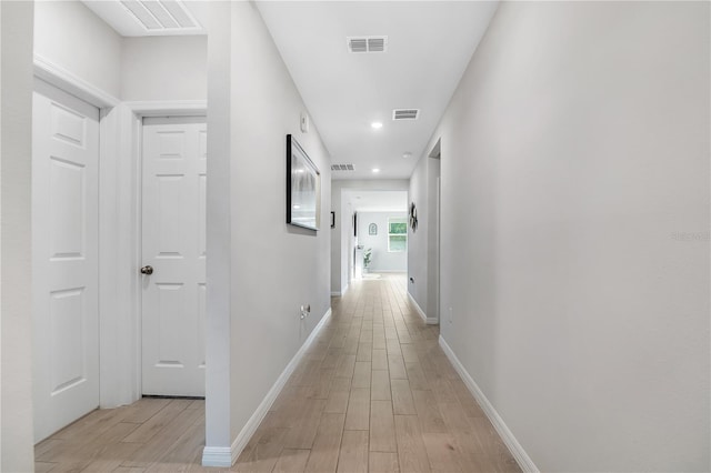 corridor featuring light wood-type flooring