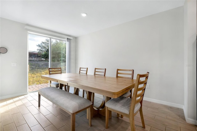 dining space featuring light hardwood / wood-style floors