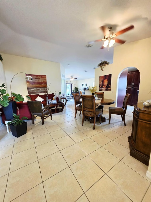 tiled dining room with ceiling fan