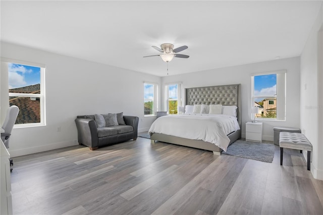 bedroom featuring ceiling fan and light wood-type flooring