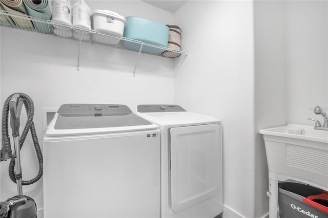 laundry room with washer and clothes dryer