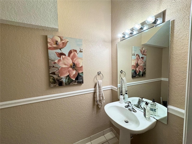 bathroom featuring sink and tile patterned floors