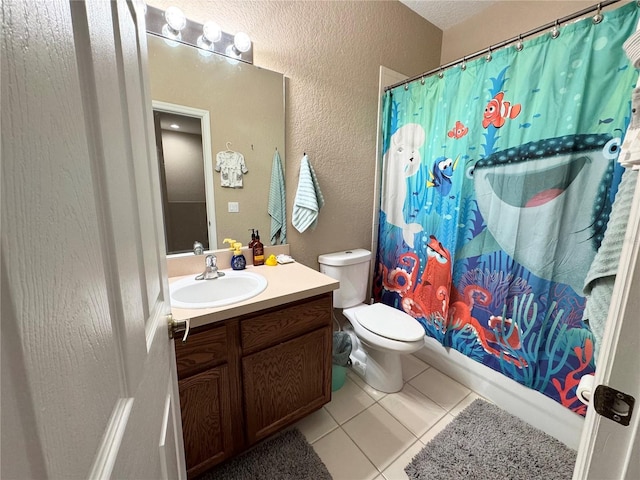 full bathroom with tile patterned flooring, vanity, shower / tub combo with curtain, and toilet